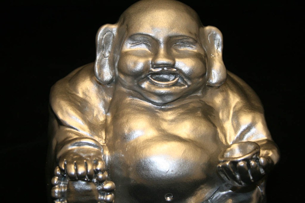 Custom clay sculpture of a silver Buddha made by Ciyo