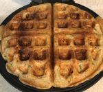 Homemade veggie Belgian waffles with a soft texture, made with vegetables and served on a plate