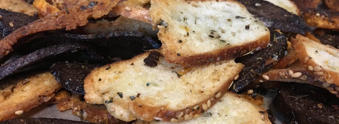 Homemade bagel chips baked until crispy and golden, served in a bowl