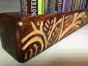 Hand Carved Oil Holder on Table top