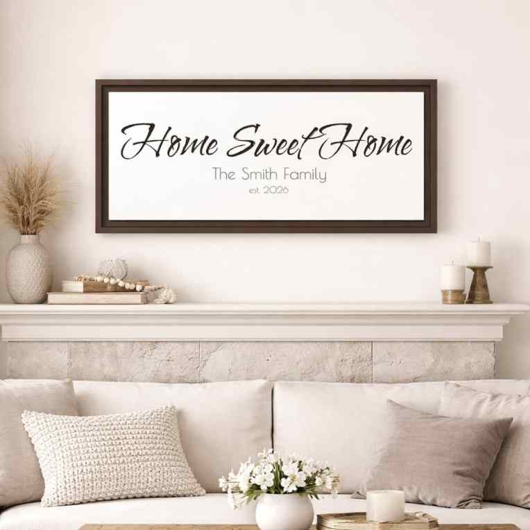 Personalized Home Sweet Home wall art with family name above couch in modern farmhouse living room